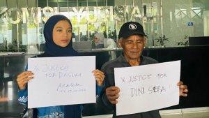 Adik-Dini-Sera-Afrianti-dan-ayahnya-saat-melapor-ke-Komisi-Yudisia.jpg
