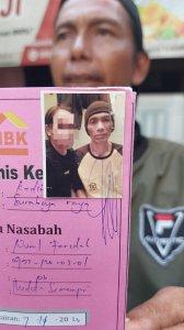 Kakak-korban-Agus-Prayitno-saat-menunjukkan-foto-semasa-hidup-dari-sang-adik-Rabu-2032024.jpg
