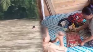Masita-seorang-ibu-menerjang-arus-sungai-demi-susu-anaknya.jpg