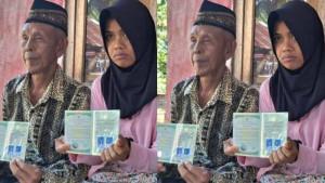 Saiun-dan-Bunga-Fitri-saat-menunjukkan-kartu-nikah.jpg