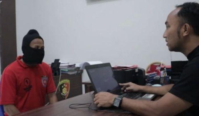 Salah-satu-tersangka-kekerasan-seksual-anak-di-bawah-umur-diringkus-Polres-Sampang.jpg