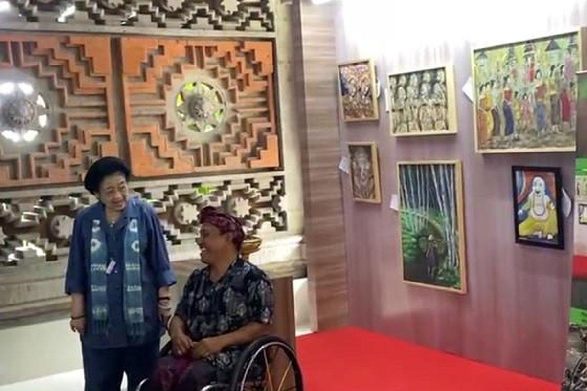 Seorang-pelukis-difabel-beruntung-membuat-Megawati-terpikat.jpg