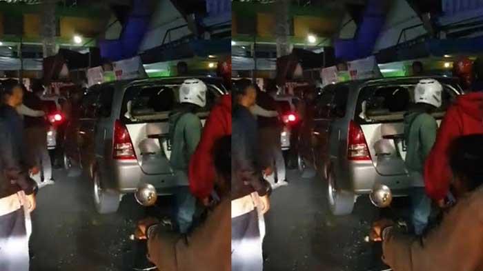 Toyota-Innova-dihentikan-sejumlah-orang-di-Jalan-MT-Haryono-Dinoyo-Lowokwaru-Kota-Malang.jpg