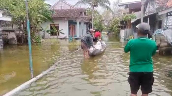ilustrasi-BANJIR-DI-LAMONGAN-Warga-terdampak-banjir-di-Lamongan-pakai-perahu.jpg