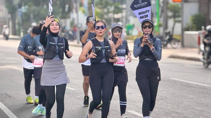 ilustrasi-lari-Beauty-pacer-tengah-berlari-sepanjang-rute-Jalan-Pemuda-Kota-Surabaya.jpg