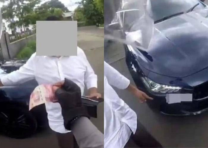 polisi-menolak-suap-Rp100-ribu-dari-pengendara-mobil-mewah-di-kawasan-Puncak-Bogor.jpg