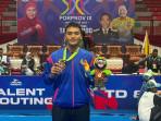 Adam-Ata-Firdaus-Atlet-Taekwondo-Jember-raih-medali-perunggu-di-Porprov-Jatim-2025.jpg