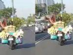 Aksi-heroik-pedagang-sayur-yang-mengawal-mobil-ambulans.jpg