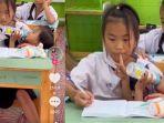 Alasan-anak-10-tahun-nekat-bawa-adiknya-ke-sekolah-saat-ujian.jpg