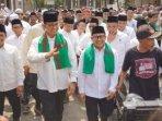 Anies-Baswedan-dan-Muhaimin-Iskandar-saat-bersilaturahmi-dengan-ulama-di-Jember.jpg