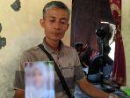 Atok-Utomo-menunjukkan-foto-anak-sulungnya-yang-menghilang-sejak-15-Mei-2023-lalu.jpg