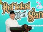 Bupati-Pasuruan-Rusdi-Sutejo-saat-memberikan-sambutan-dalam-acara-refleksi-hari-santri.jpg