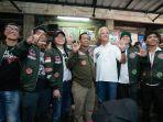 Capres-Ganjar-Pranowo-dan-Cawapres-Mahfud-MD-mendatangi-markas-Slank.jpg