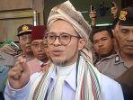 Fahim-Mawardi-Keluar-dari-ruang-Persidangan-Pengadilan-Negeri-Jember.jpg
