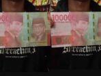 Hendra-Menyesal-Pembeli-Rokok-Bayar-Pakai-Uang-Palsu-Pelaku-Berani-Kembali-Minta-Tukar-Pecahan.jpg