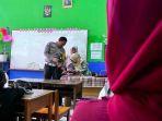 Ilham-bocah-SD-tulis-surat-ke-polisi-minta-ditemani-ambil-rapor-ke-sekolah.jpg