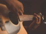 Ilustrasi-gitar-untuk-lirik-lagu-populer.jpg