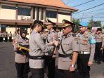 Kapolres-Bojonegoro-AKBP-Mario-Prahatinto-saat-memimpin-prosesi-serah-terima.jpg
