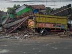 Kondisi-truk-saat-menabrak-rumah-di-Desa-Catak-Gayam-Kecamatan-Mojowarno-Jombang.jpg