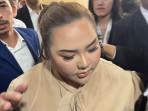 Lisa-Mariana-saat-menghadiri-persidangan.jpg