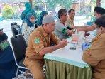 Masyarakat-memanfaatkan-layanan-cek-kesehatan-gratis-di-Kantor-Kecamatan-Bangil.jpg