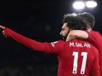 Mohamed-Salah-usai-mencetak-gol-untuk-Liverpool.jpg