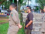 ODGJ-pamer-kemaluan-di-Alun-alun-Kota-Malang-diamankan.jpg