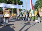 Pasukan-bregodo-membawa-foto-Bupati-Blitar-dari-periode-ke-periode-saat-acara-Pisowanan-Agung.jpg