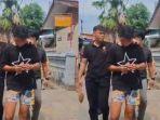 Polisi-menangkap-pria-berinisial-RZ-seusai-nyaris-diamuk-massa-menganiaya-kekasihnya.jpg