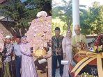 Pria-Madura-bawa-buket-uang-raksasa-beserta-mobil-baru-lengkap-BPKB.jpg