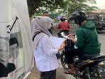 Relawan-Jatim-Beragam-Cabang-Ponorogo-Bagi-Goodie-Bag-Pengendara-Alhamdulillah.jpg