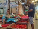 Salah-seorang-pedagang-di-Pasar-Tradisional.jpg