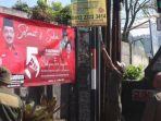 Sejumlah-banner-dan-baliho-mulai-bertebaran-menghiasi-jalanan-di-Kota-Batu-jelang-Pilkada.jpg