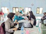 Suasana-kegiatan-pelaksanaan-Jumat-Curhat-dan-Gebyar-Vaksinasi-Polresta-Malang-Kota.jpg