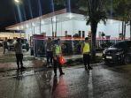 Tampak-sejumlah-anggota-polisi-berjaga-di-depan-pintu-masuk-Gereja-Immanuel-d.jpg