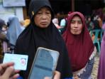 Banyuwangi Jadi Pilot Project Nasional Digitalisasi Bansos, Warga Sambut Antusias: Tak Meleset