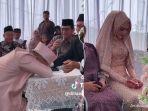Viral-kisah-pernikahan-sepasang-pengantin-yang-sudah-pacaran-hampir-16-tahun-lamanya.jpg