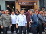 Warga-antusias-menyambut-kedatangan-Presiden-Jokowi-ke-Pasar-Bululawang-Kecamatan-Bululawang.jpg