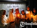 aliansi-mayarakat-anti-korupsi-menyalakan-lilin-dalam-istigasah-di-depan-gedung-dprd-kota-malang_20180906_203906.jpg