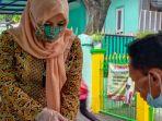 berita-surabaya-lia-istifhama-saat-memilih-di-tps-023-jemur-wonosari-wonocolo-surabaya.jpg