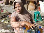berita-surabaya-menik-penjual-jamu-di-surabaya-pasar-keputran.jpg