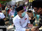 calon-wali-kota-eri-cahyadi-saat-menyapa-pendukungnya-dalam-kampanye-dan-peresmian-posko-kemenangan.jpg
