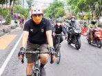 calon-wali-kota-surabaya-machfud-arifin-mengawali-masa-tenang-sebelum-dengan-bersepeda.jpg