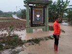 ilustrasi-BANJIR-DI-BOJONEGORO-Petugas-BPBD-Bojonegoro-saat-assessment-di-lokasi-banjir.jpg