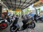 ilustrasi-bengkel-motor-di-Bojonegoro-ramai-didatangi-warga-ilustrasi-servis-motor.jpg