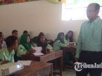 joeliantono-hadi-kepala-smk-dr-soetomo-bonek-mania_20180728_142759.jpg