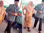 momen-siswa-SMP-wisuda-tanpa-alas-kaki-berjalan-sambil-gandeng-ibunda.jpg