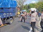 olah-tkp-kecelakaan-polisi-tewas-ditabrak-truk-di-ngawi.jpg