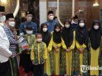 pemberian-santunan-dari-baznas-kota-malang-yang-diserahkan-wali-kota-malang-drs-h-sutiaji.jpg
