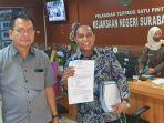 pengacara-tersangka-kasus-dugaan-penggelapan-barang-sitaan-satpol-pp-surabaya.jpg